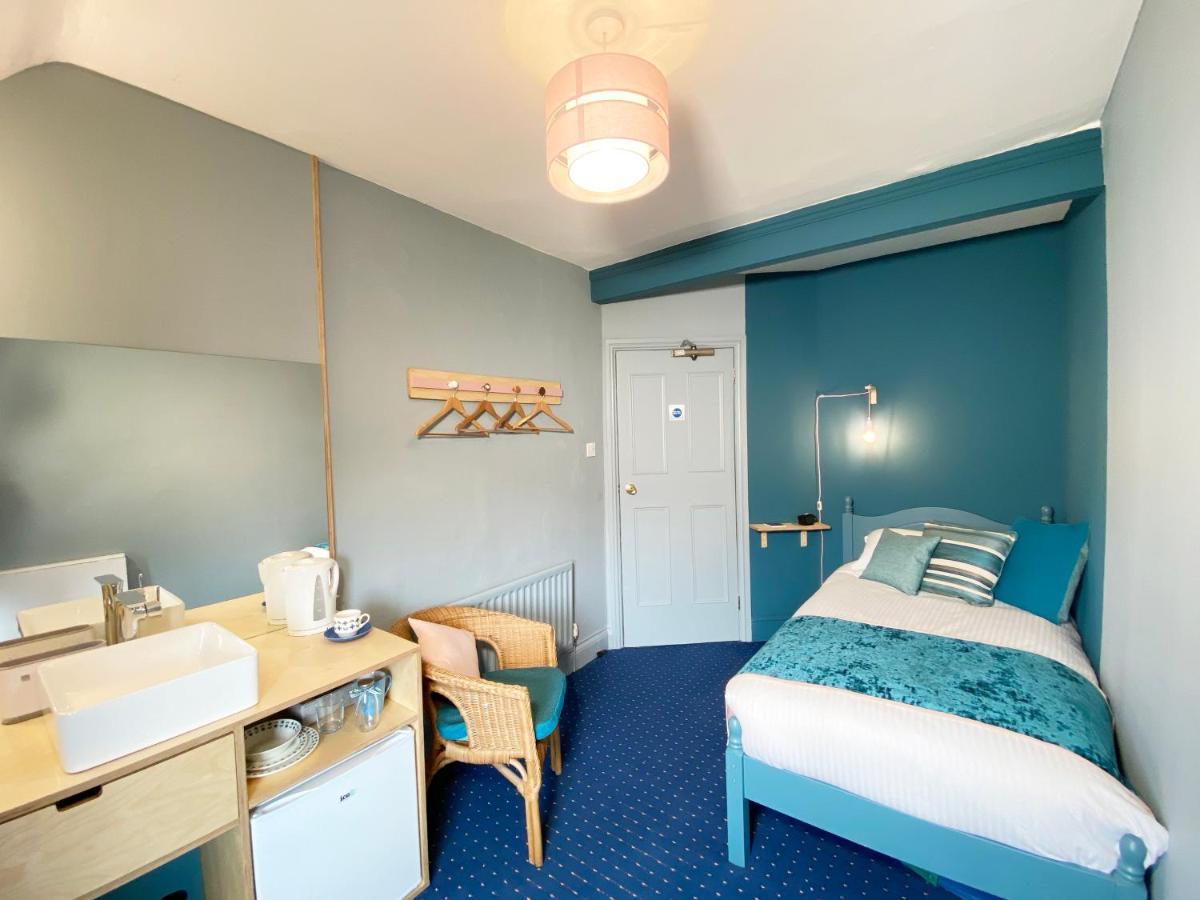 Single Room with Shared Shower and Toilet