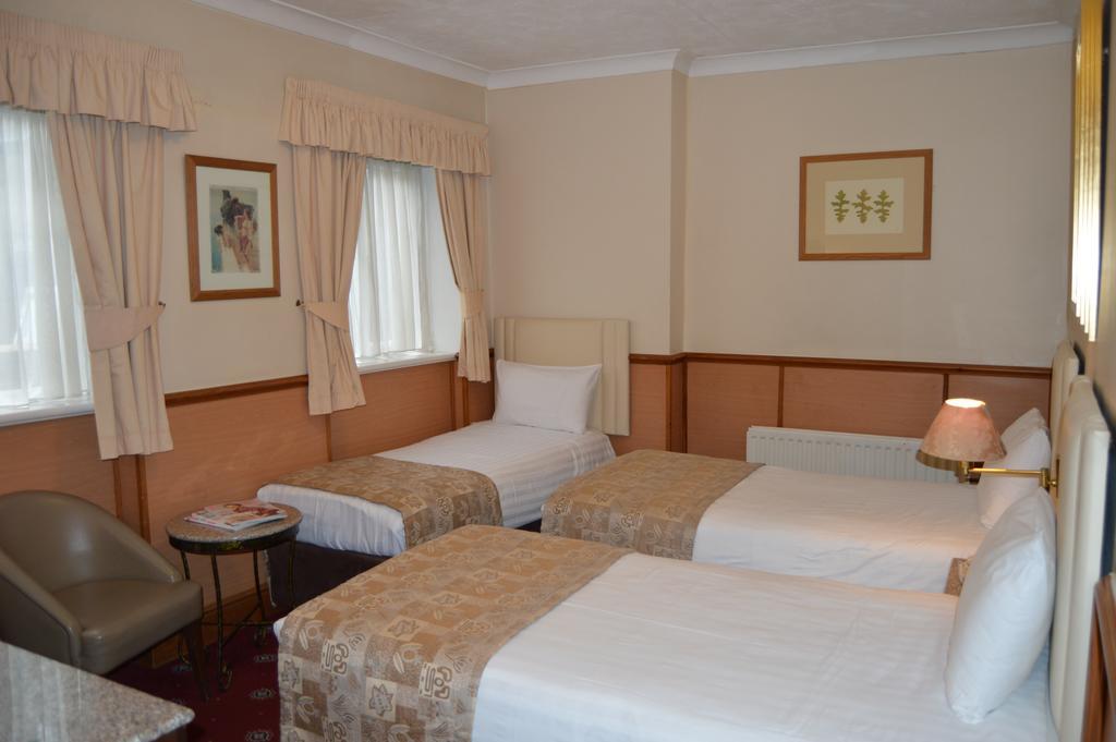 Quarto Triplo Executivo