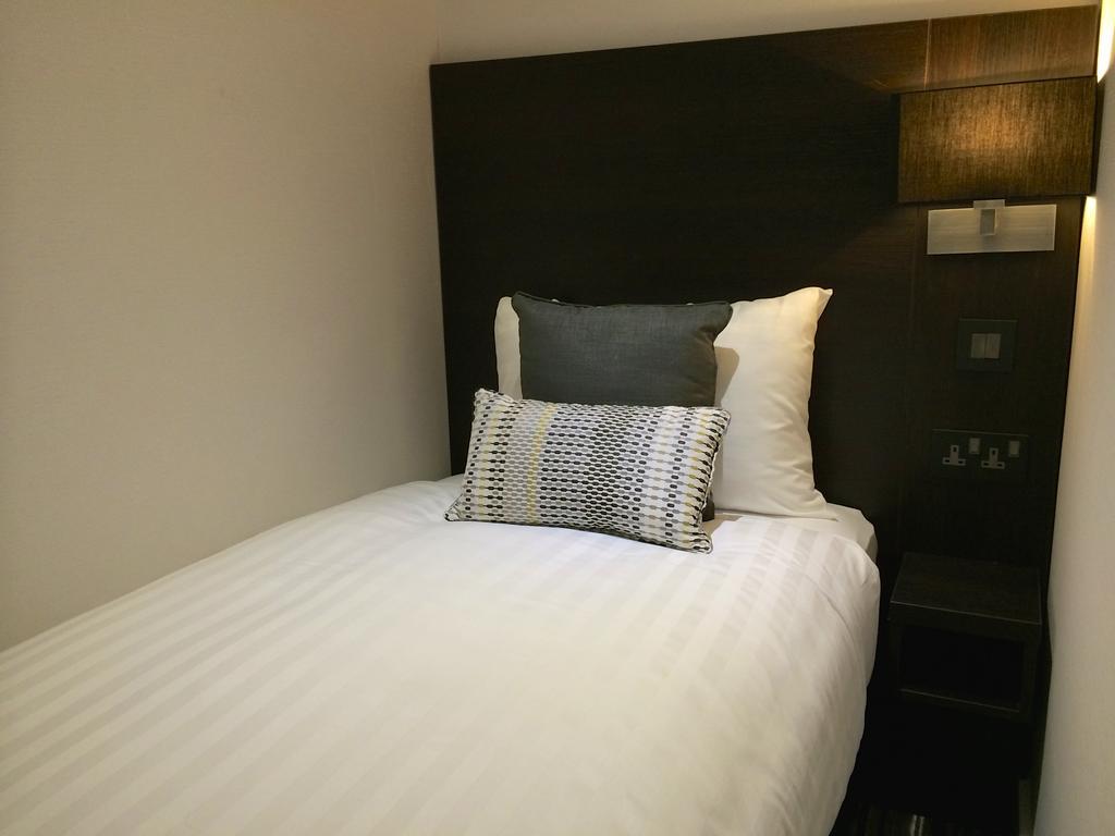 Quarto Individual Petite com Casa de Banho Privativa