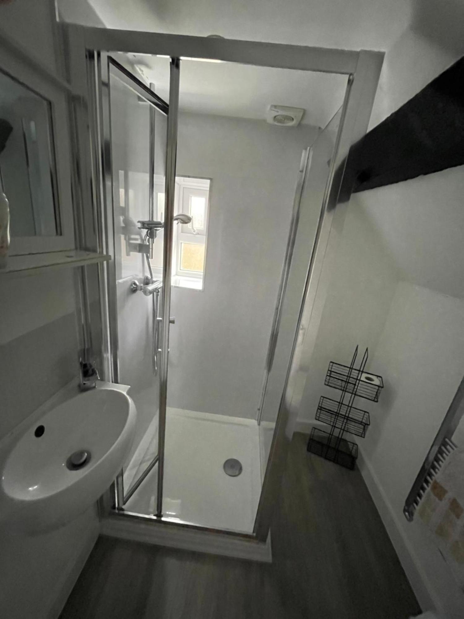 Family Room Private Bathroom,1528168018:JPEG