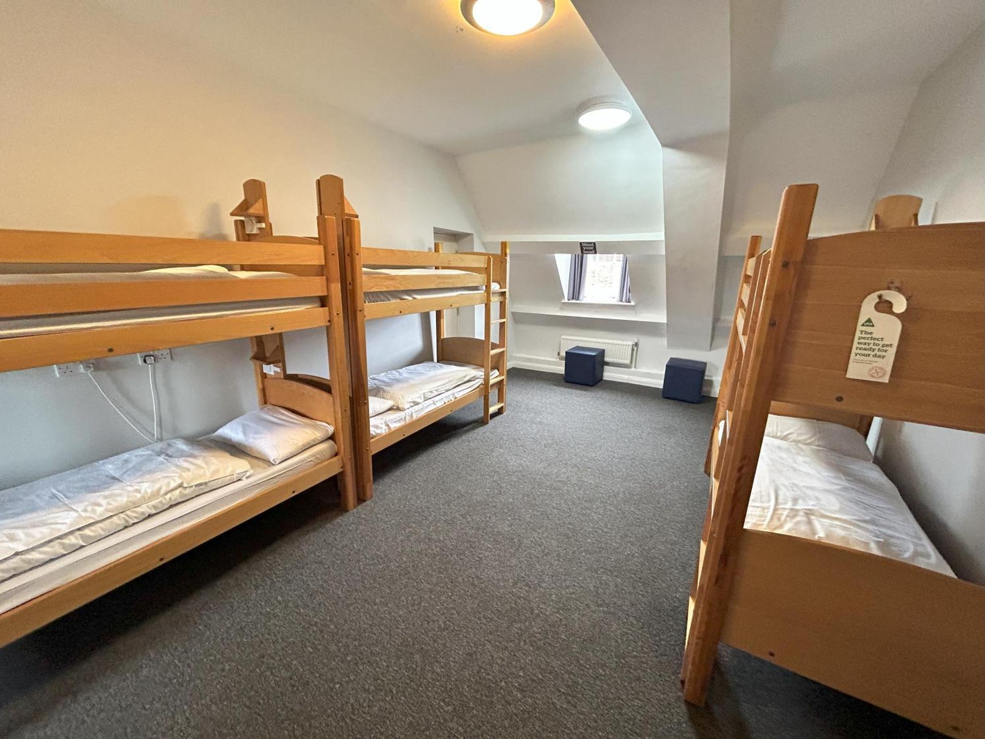 Bunk Bed in Male Dormitory Room with Shared Bathroom