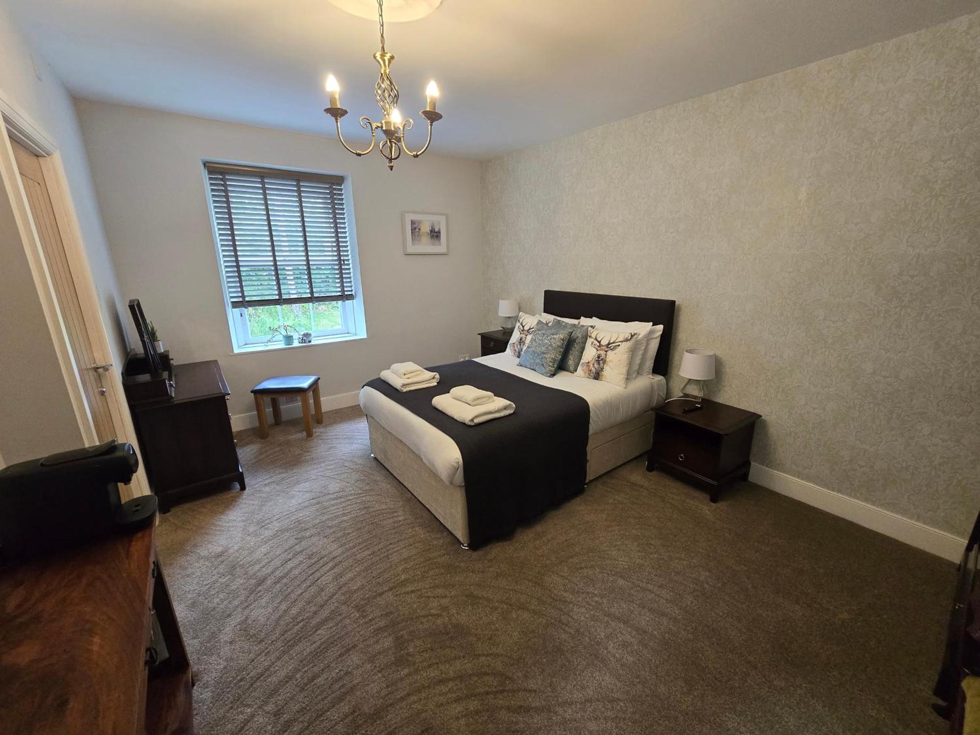 Deluxe Family Room,1597760751:JPEG