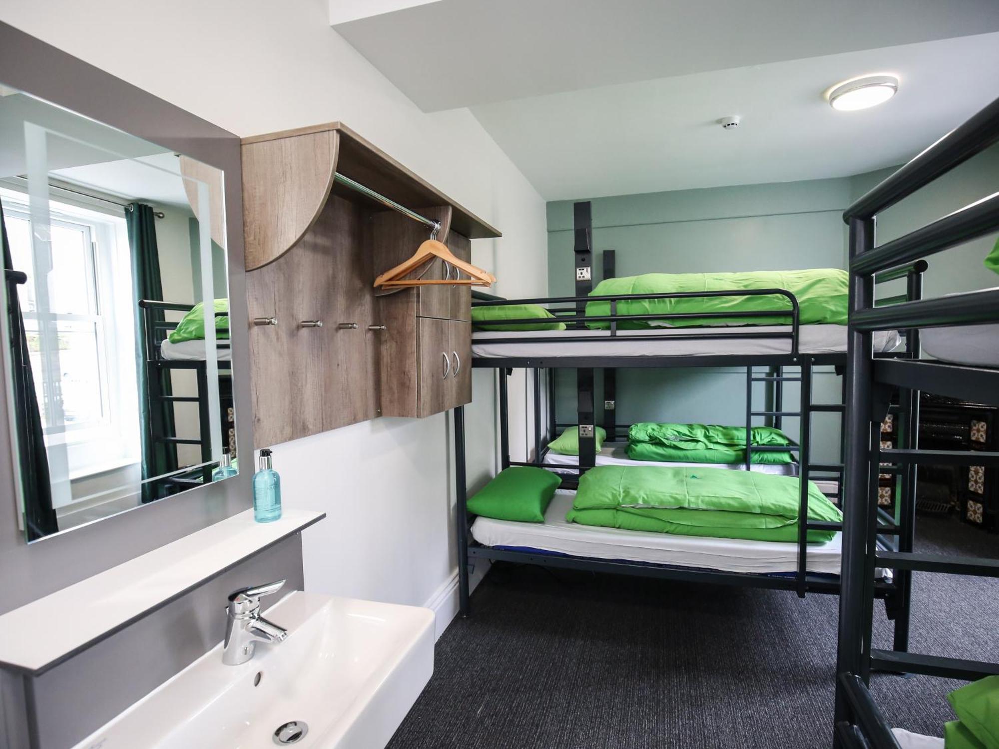 Bunk Bed in Male Dormitory Room with Shared Bathroom