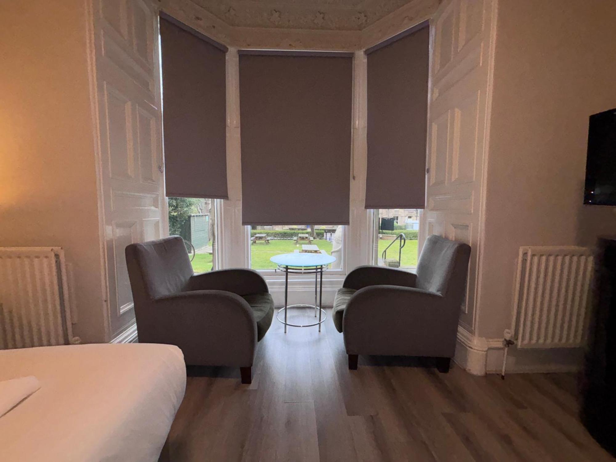 Quarto Família com Vista para o Jardim