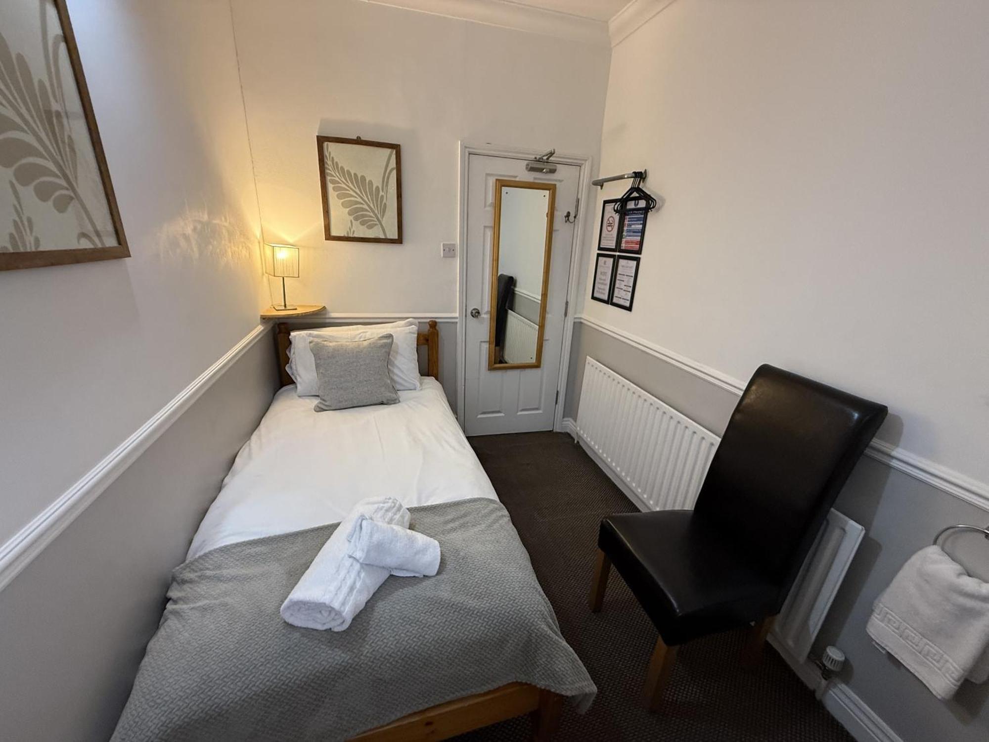 Eenpersoonskamer met Gedeelde Badkamer