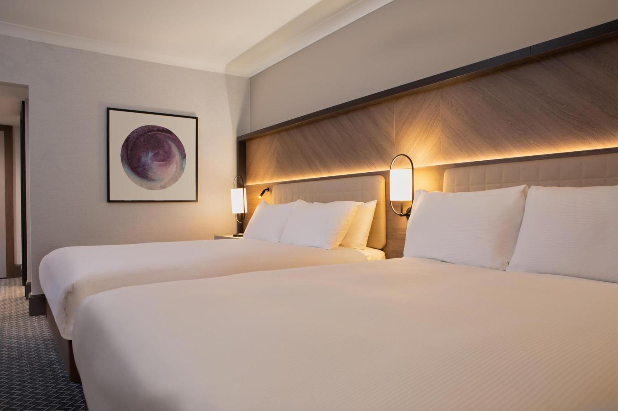 Kamer met 2 Queensize Bedden
