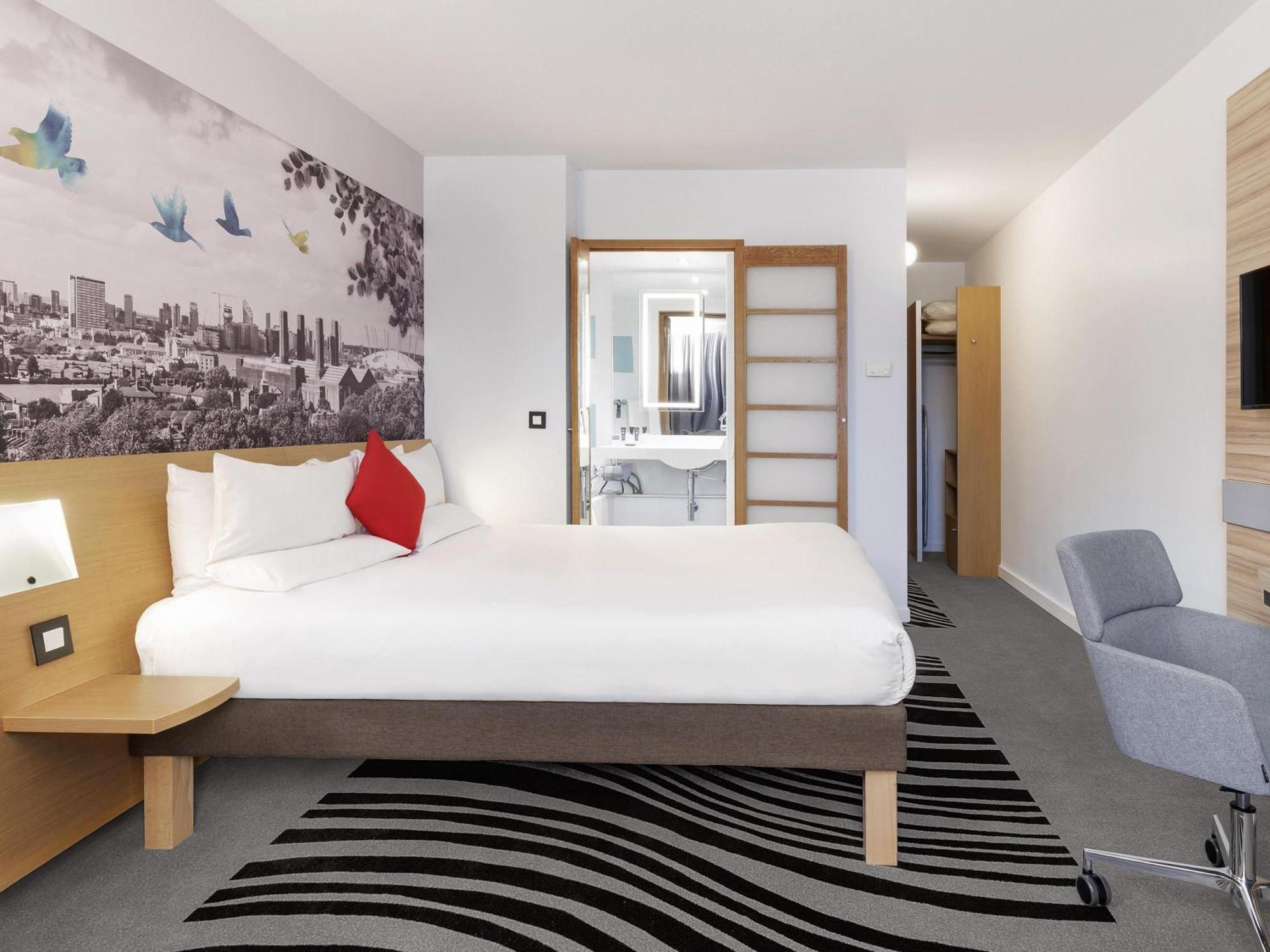Superior Kamer met 1 Queensize Bed + Slaapbank
