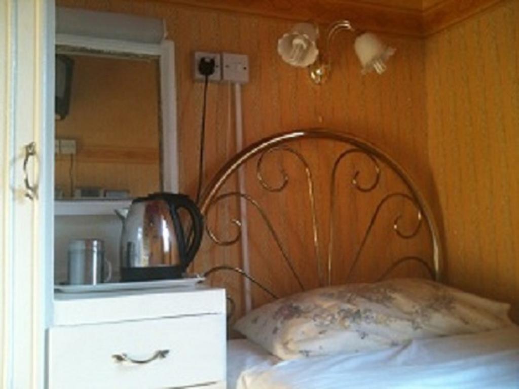Camera Singola con Bagno in Comune
