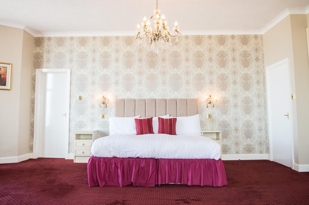 Suite met Kingsize Bed en Uitzicht op Zee