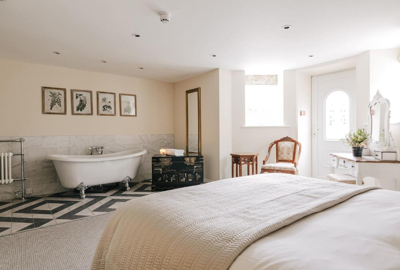 Habitación Deluxe con cama extragrande y bañera